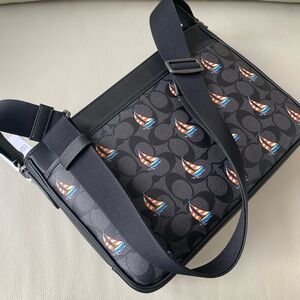 Coach Signature messenger laptop bag with Sailboat accents